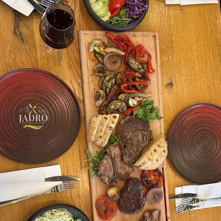 Premium steak platter with grilled vegetables, flatbread, and red wine, Gastro Kutak Jadro experience